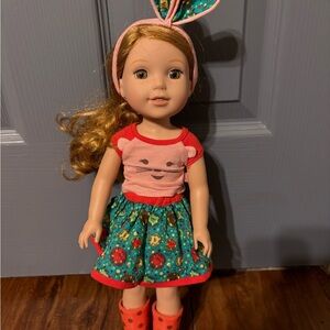 American Girl Doll with Red and Green Outfit